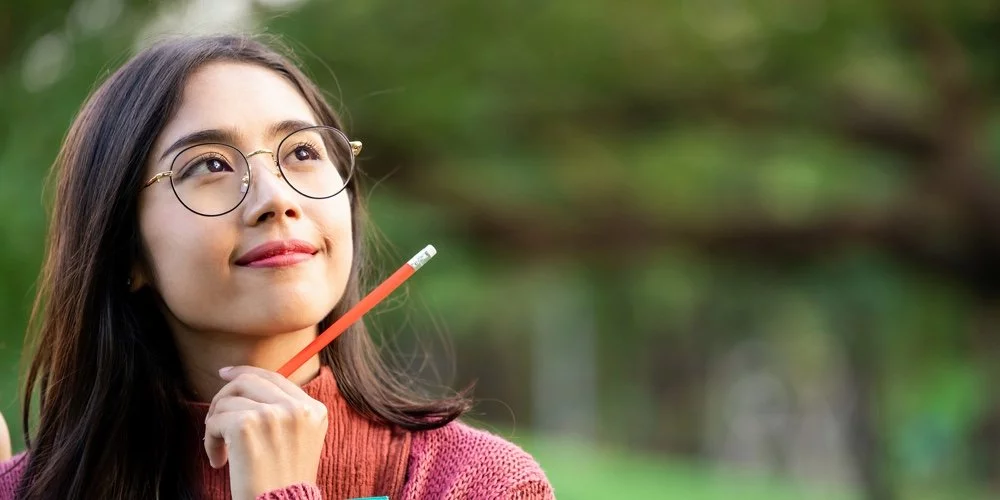 Creative student thinking about her future